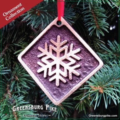 Snowflake ornament - natural rubbed finish cast bronze w/red velvet drawstring bag. Made in USA.