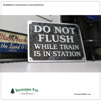 DO Not Flush While Train is in Station sign - cast aluminum